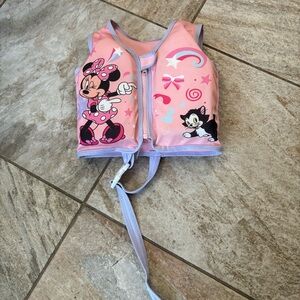 Minnie Mouse swim vest in S/M up to 40 pounds Some marks GUC